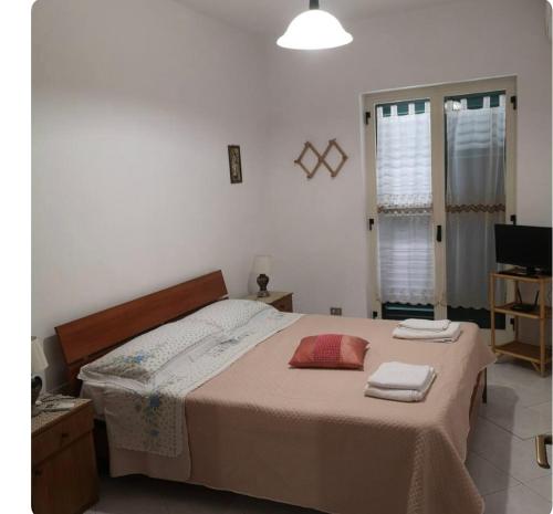 Katil atau katil-katil dalam bilik di Canneto appartments