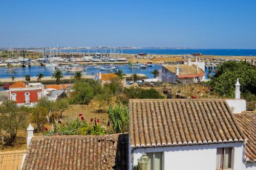a view of a harbor with boats in the water at New Village Guest House in Lagos