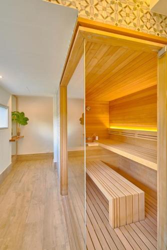 a room with a sauna with a wooden ceiling at Aquarella Caribbean Blue Summer Special GateAway in La Puntica de Juan Dolio