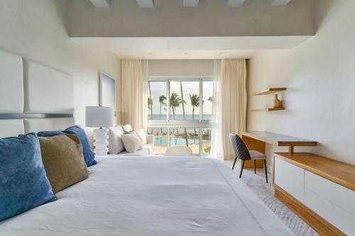 Postel nebo postele na pokoji v ubytování Luxurious Caribbean Apt Aquarella