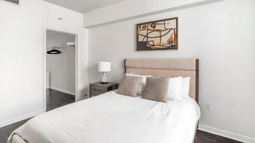 Ένα ή περισσότερα κρεβάτια σε δωμάτιο στο Landing Apartments - Fort Lauderdale