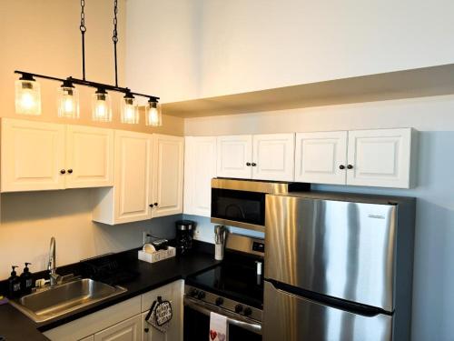 Η κουζίνα ή μικρή κουζίνα στο Charming 2 Bedroom Loft