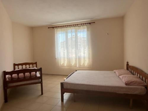 Giường trong phòng chung tại Hotel Shire