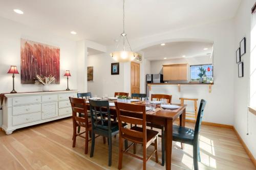 a dining room and kitchen with a table and chairs at Rigden Retreat Garage, Dog Friendly, Near Trails in Fort Collins