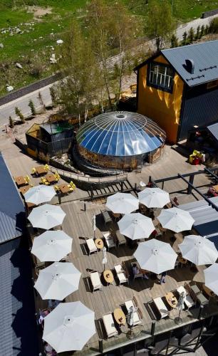 an overhead view of a group of white umbrellas at SarySai in Almaty