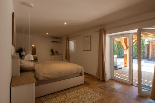 Ένα ή περισσότερα κρεβάτια σε δωμάτιο στο Villa haut de Gamme - Le Gageac - Piscine & Spa