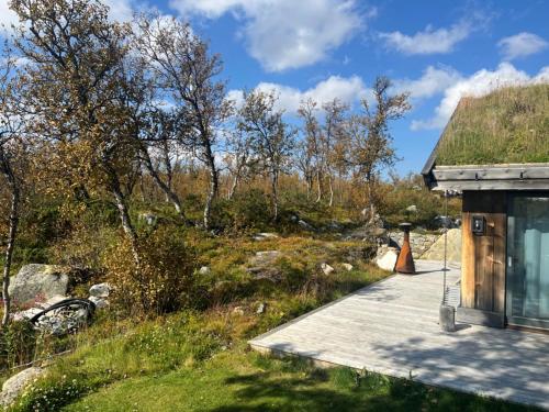 Κήπος έξω από το Spacious, exclusive and modern cabin in Geilo