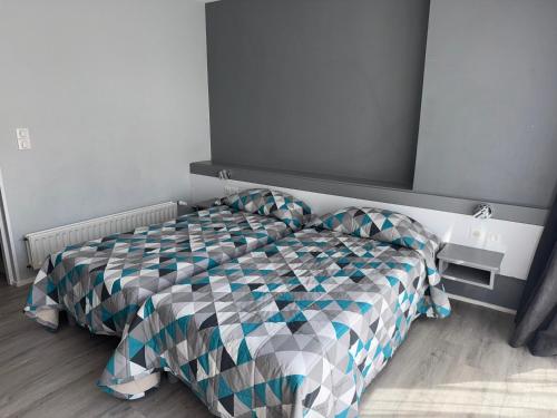 Ένα ή περισσότερα κρεβάτια σε δωμάτιο στο Hôtel Dupleix - Hyper centre - Réouverture