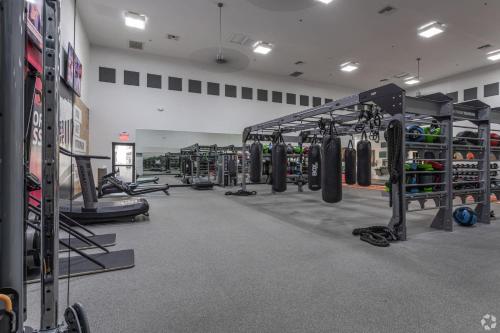 a gym with lots of equipment in a room at Boulevard Stays 2BR by Stadium Pool Parking Gym 05 in Glendale
