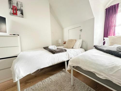 Ένα ή περισσότερα κρεβάτια σε δωμάτιο στο Wembley Stadium Maisonette