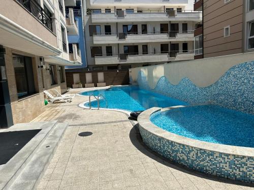 Swimmingpoolen hos eller tæt på Sunrise Apartment