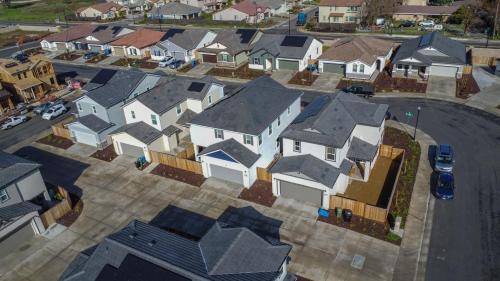an overhead view of houses in a residential neighborhood at Spacious 4BR-3BA Cozy and Modern in Elk Grove in Elk Grove