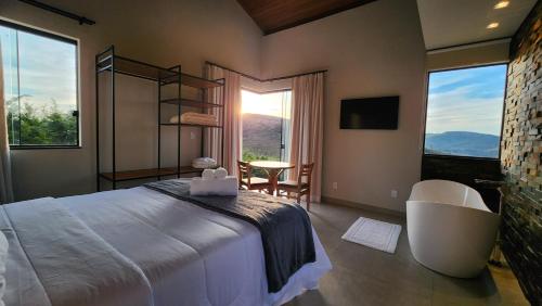 Postel nebo postele na pokoji v ubytování Lavras Inn