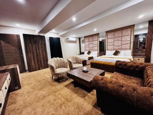 Гостиная зона в OXVUE Boutique Hotel