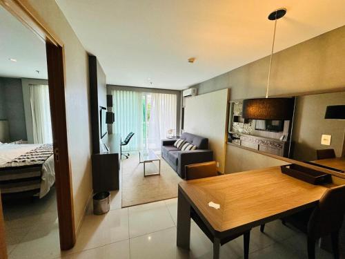 En eller flere senge i et værelse på Brisas do Lago