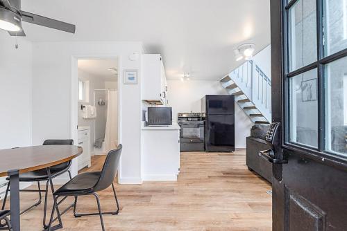 a kitchen and dining room with a table and chairs at Tidal House #2 in Ocean Shores