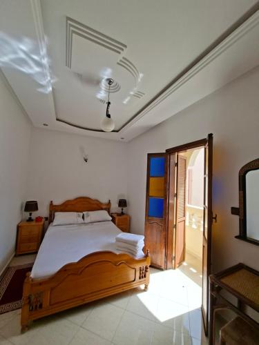 Postel nebo postele na pokoji v ubytování Casa Mogador