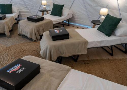 Voodi või voodid majutusasutuse Glamping La Divina toas