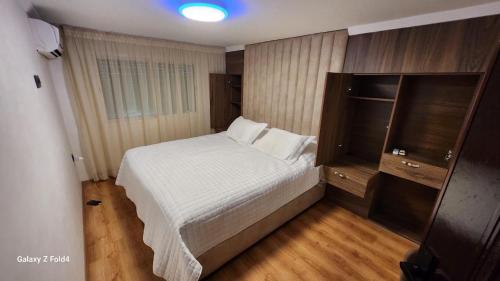 Ένα ή περισσότερα κρεβάτια σε δωμάτιο στο Apartment in Harhoura