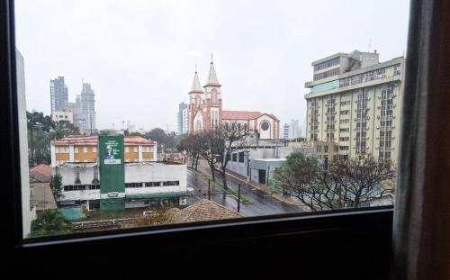 a view from a window of a city with buildings at Studio 706 Premium no Centro de Chapecó com Piscina Academia e Vaga Garagem AP Completo in Chapecó