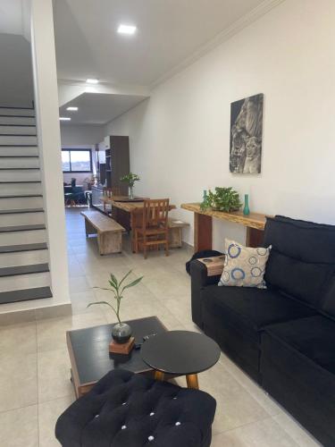Χώρος καθιστικού στο Quarto com Varanda e Vista para a Mata