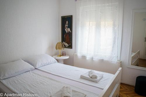 Apartman Ristovicにあるベッド