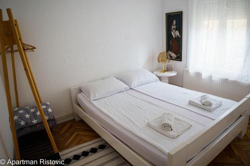 Apartman Ristovicにあるベッド