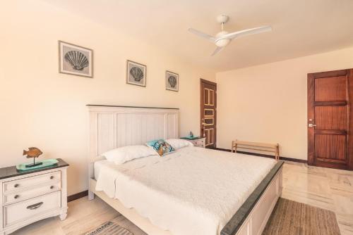 a bedroom with a bed and a ceiling fan at Apartment with 2bedrooms in Portillo Residences in Abra Grande