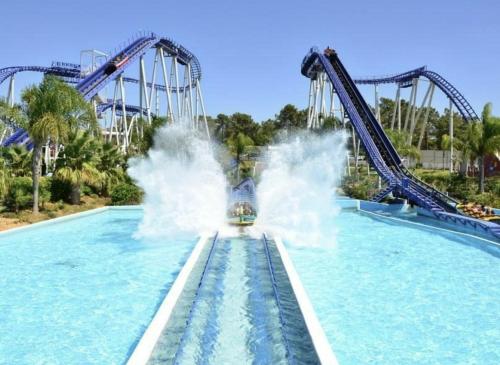 a roller coaster in the water at a theme park at Mae Joana pool&beach Faro villa in FAO