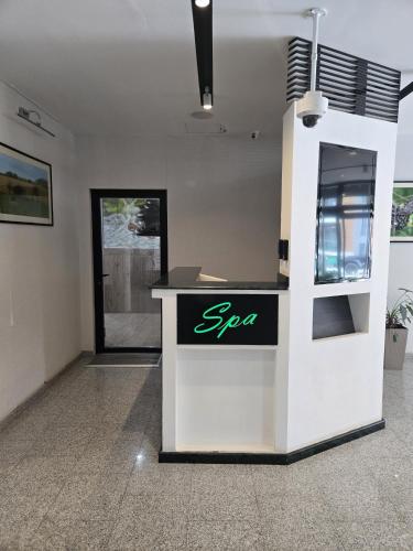 an empty office with a spa sign on a counter at Orbi Palace Bakuriani in Bakuriani