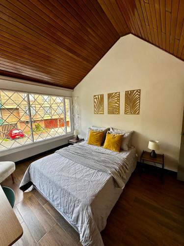 Postel nebo postele na pokoji v ubytování 313homebogotá
