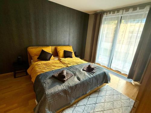 Ένα ή περισσότερα κρεβάτια σε δωμάτιο στο Garden Residence Terrace Apartment