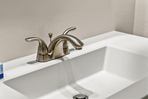 a bathroom sink with a chrome bathroom faucet at The Iconic Vail Ski Dome, Free parking for skiers! in Vail