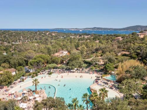 an aerial view of a pool at a resort at Restanques appartement vue mer in Grimaud