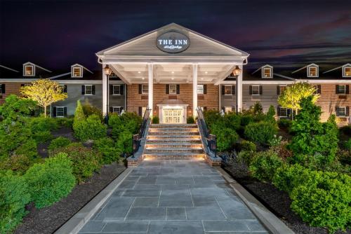 a building with a sign that reads the inn at The Inn at Lewisburg, BW Signature Collection in Lewisburg