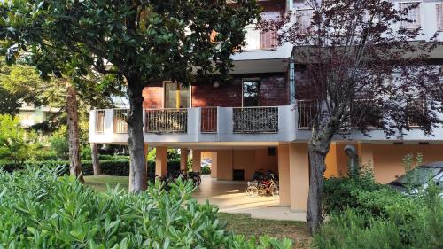 a house with a balcony on the side of it at Silvi Marina - Appartamenti Sesia in Silvi Marina