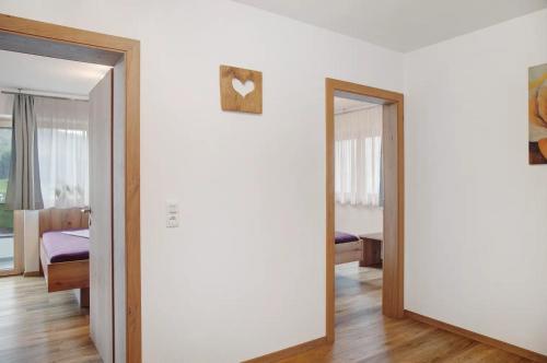 Postel nebo postele na pokoji v ubytování Bergliebe Apartments