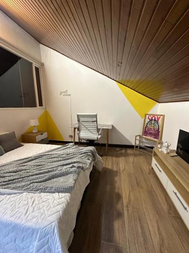 Postel nebo postele na pokoji v ubytování 313homebogotá