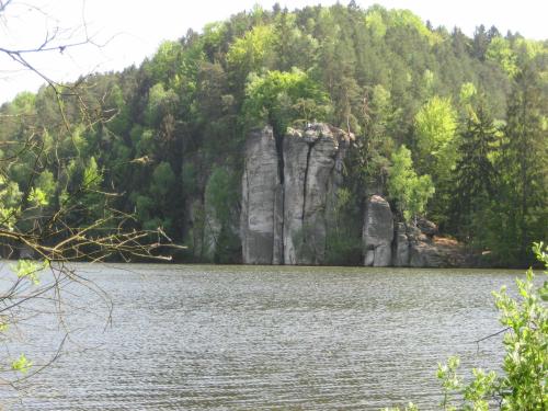 a view of a lake with a mountain in the background at Pension Jana - Wellness in Jilemnice