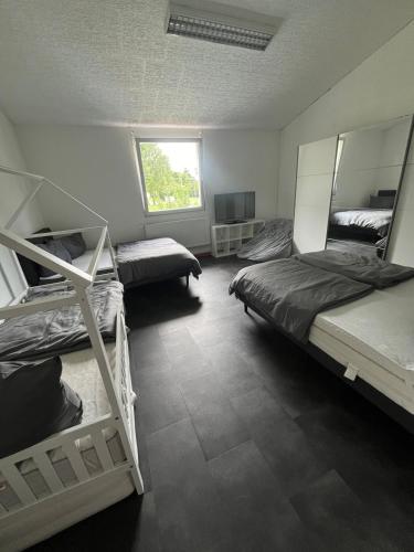Ένα ή περισσότερα κρεβάτια σε δωμάτιο στο Big Loft