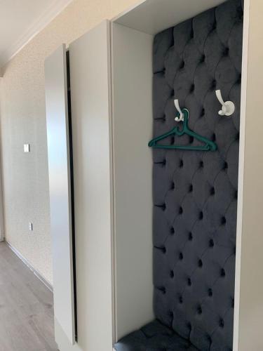 a room with a closet with a wall at Astara Terrace 2-45 in Astara