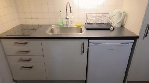 Küche/Küchenzeile in der Unterkunft Orebro Hideaway