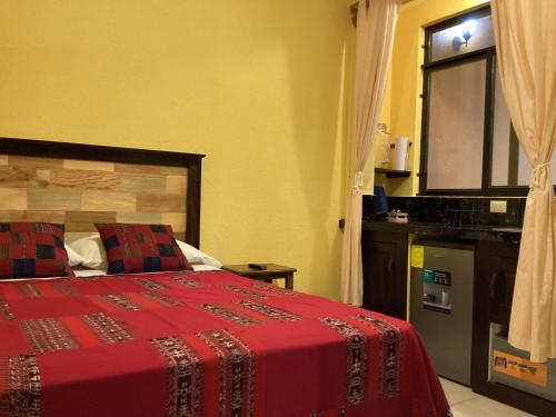 Katil atau katil-katil dalam bilik di Andrea apartamento