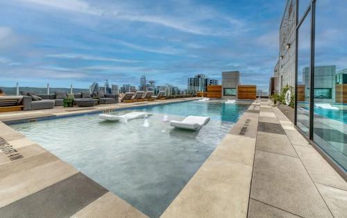 a swimming pool on the roof of a building at Del Rio at the Rainey District in Austin