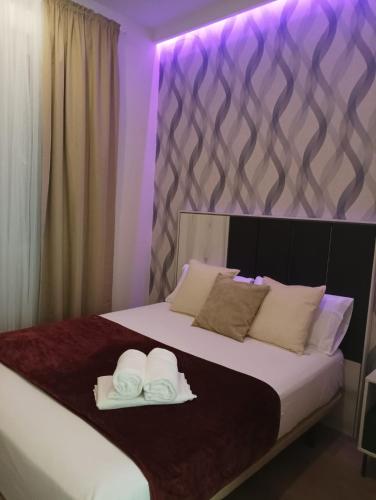 Letto o letti in una camera di Paradise Suites Madrid