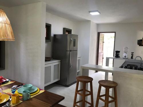 Kuchnia lub aneks kuchenny w obiekcie Cajarana Casa de Charme, Milagres Pé na Areia