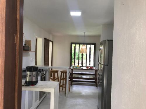 Kuchnia lub aneks kuchenny w obiekcie Cajarana Casa de Charme, Milagres Pé na Areia