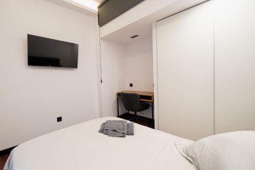 Ένα ή περισσότερα κρεβάτια σε δωμάτιο στο Coliving Canteras Connect Suites