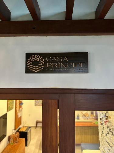 a sign on the wall of a building at Casa Príncipe Atins in Atins