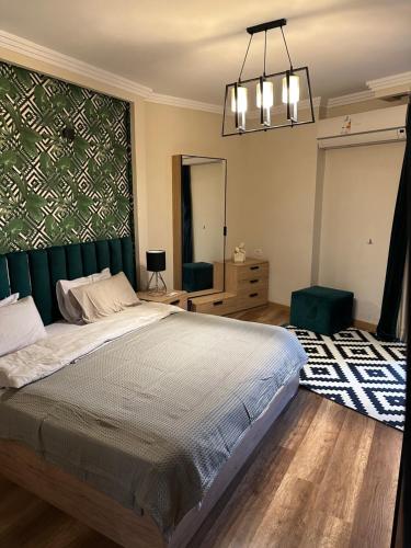 Ένα ή περισσότερα κρεβάτια σε δωμάτιο στο Luxurious apartment in cairo